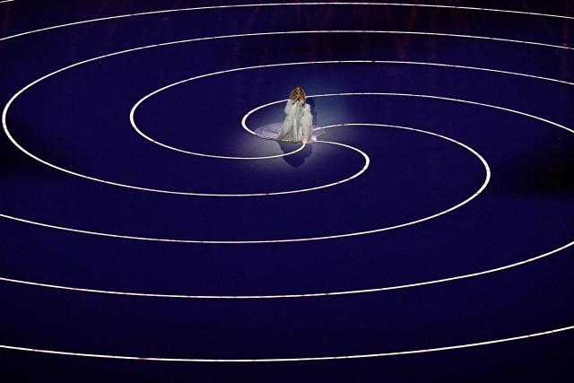 TOPSHOT - US singer Mariah Carey performs during the opening ceremony of the Milano Cortina 2026 Winter Olympic Games at the San Siro stadium in Milan, northern Italy, on February 6, 2026. (Photo by Gabriel BOUYS / AFP)