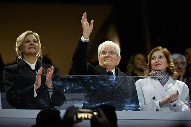 (From L) President of the International Olympic Committee (IOC) Kirsty Coventry, Italy's President Sergio Mattarella and his daughter Laura Mattarella attend the opening ceremony of the Milano Cortina 2026 Winter Olympic Games at the San Siro stadium in Milan, northern Italy, on February 6, 2026. (Photo by WANG Zhao / AFP)