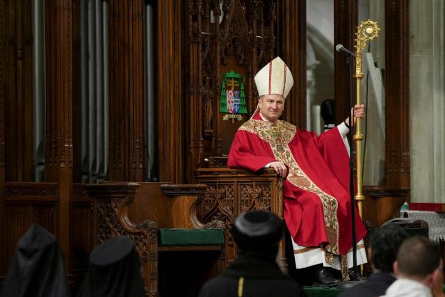 New York Archbishop-designate Ronald A. Hicks, who is taking over from Cardinal Timothy Dolan, who has held the post since 2009, attends his installation Mass at St. Patrick's Cathedral in New York, on February 6, 2026. (Photo by Angelina Katsanis / POOL / AFP)