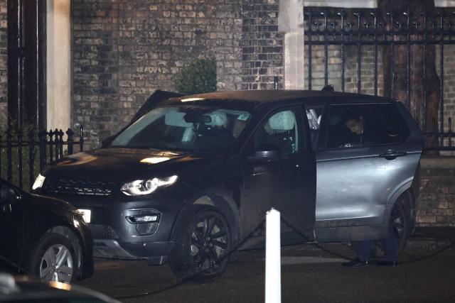 Police officers search inside a car, parked outside the residence of Former UK ambassador to the United States, Peter Mandelson, in central London on February 6, 2025. UK police probing Mandelson were searching two properties on February 6, 2026, London's Metropolitan Police said, following fresh revelations in the Epstein files. The searches came as Prime Minister Keir Starmer faces intense scrutiny over his decision to appoint Mandelson as the country's US envoy despite his association with convicted US sex offender Jeffrey Epstein. (Photo by Henry NICHOLLS / AFP)