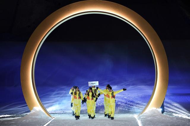 Athletes from Team Belgium arrive during the opening ceremony of the Milano Cortina 2026 Winter Olympic Games in Livigno, northern Italy, on February 6, 2026. (Photo by Cameron Spencer / POOL / AFP)