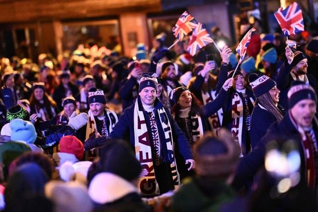 Members of Britain's delegation parade during the opening ceremony of the Milano Cortina 2026 Winter Olympic Games in Cortina d'Ampezzo, northern Italy, on February 6, 2026. (Photo by Marco BERTORELLO / AFP)
