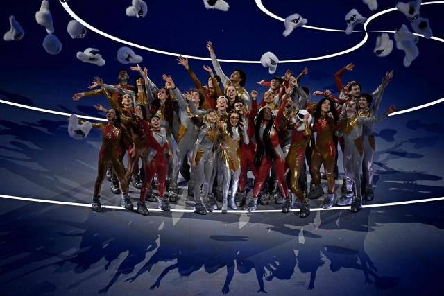 Italian actress Sabrina Impacciatore (C) performs during the opening ceremony of the Milano Cortina 2026 Winter Olympic Games at the San Siro stadium in Milan, northern Italy, on February 6, 2026. (Photo by Gabriel BOUYS / AFP)