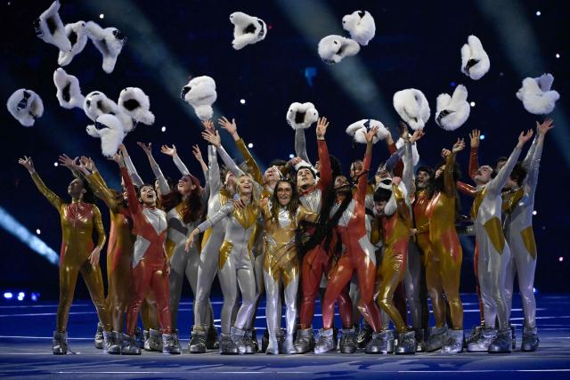 dancers perform during the opening ceremony of the Milano Cortina 2026 Winter Olympic Games at the San Siro stadium in Milan, northern Italy, on February 6, 2026. (Photo by WANG Zhao / AFP)