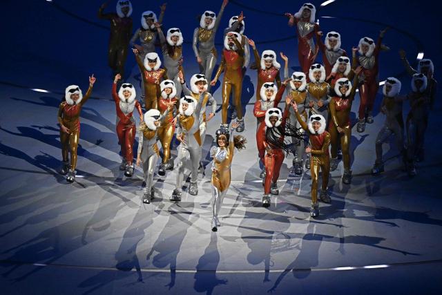 Italian actress Sabrina Impacciatore (C) performs during the opening ceremony of the Milano Cortina 2026 Winter Olympic Games at the San Siro stadium in Milan, northern Italy, on February 6, 2026. (Photo by Gabriel BOUYS / AFP)
