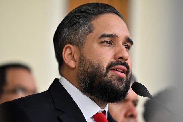 Venezuelan Deputy Nicolas Maduro Guerra, son of ousted President Nicolas Maduro speaks to the press after a meeting between the Venezuelan Parliament's Internal Policy Committee and deans of Venezuelan university law faculties in Caracas, on February 6, 2026. The president of the Venezuelan Parliament met with relatives of political prisoners at a detention center in Caracas on february 6 and promised them that they would be released within a week at the latest. (Photo by Juan BARRETO / AFP)