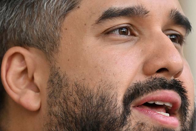 Venezuelan Deputy Nicolas Maduro Guerra, son of ousted President Nicolas Maduro speaks to the press after a meeting between the Venezuelan Parliament's Internal Policy Committee and deans of Venezuelan university law faculties in Caracas, on February 6, 2026. The president of the Venezuelan Parliament met with relatives of political prisoners at a detention center in Caracas on february 6 and promised them that they would be released within a week at the latest. (Photo by Juan BARRETO / AFP)