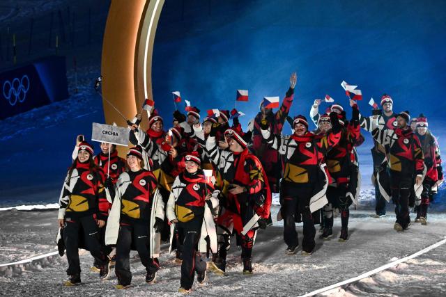 Members of the delegation of Czech Republic parade during the opening ceremony of the Milano Cortina 2026 Winter Olympic Games in Livigno, northern Italy, on February 6, 2026. (Photo by Jeff PACHOUD / AFP)
