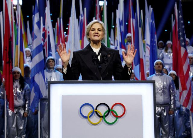 President of the International Olympic Committee (IOC) Kirsty Coventry delivers a speech during the opening ceremony of the Milano Cortina 2026 Winter Olympic Games at the San Siro stadium in Milan, northern Italy, on February 6, 2026. (Photo by Yves Herman / POOL / AFP)