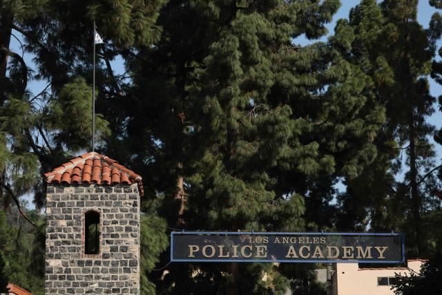 The entrance of the Los Angeles Police Academy during an LAPD recruit class graduation in Los Angeles, California on February 6, 2026. The Los Angeles Police Academy holds a graduation ceremony for 26 recruit officers, including 24 for the LAPD, one for the Los Angeles Airport Police and one for the Los Angeles Port Police. (Photo by Patrick T. Fallon / AFP)