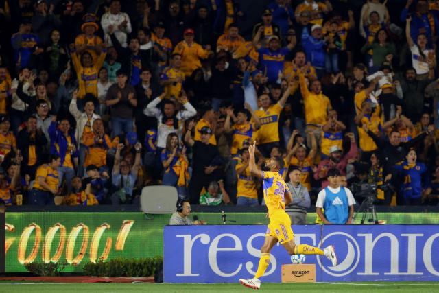 Tigres' Brazilian defender #28 Joaquim Henrique celebrates after scoring the equalising goal during the Liga MX Clausura football match between Tigres and Santos Laguna at the University Stadium (UANL) in San Nicolas de los Garza, Mexico, on February 6, 2026. (Photo by Julio Cesar AGUILAR / AFP)