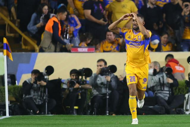 Tigres' Brazilian defender #28 Joaquim Henrique celebrates after scoring the equalising goal during the Liga MX Clausura football match between Tigres and Santos Laguna at the University Stadium (UANL) in San Nicolas de los Garza, Mexico, on February 6, 2026. (Photo by Julio Cesar AGUILAR / AFP)