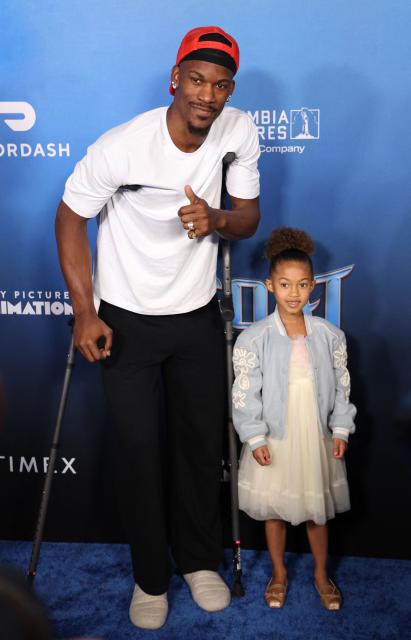 US basketball player Jimmy Butler and his daughter Rylee attend the LA premiere of Columbia Pictures and Sony Pictures Animation's "Goat" at the AMC Century City 15 in Los Angeles on February 6, 2026. (Photo by Michael Tran / AFP)