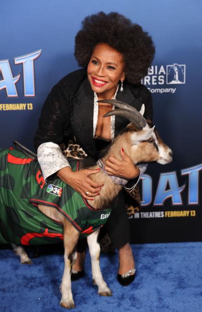 US actress singer Jenifer Lewis poses with a goat as she attends the LA premiere of Columbia Pictures and Sony Pictures Animation's "Goat" at the AMC Century City 15 in Los Angeles on February 6, 2026. (Photo by Michael Tran / AFP)
