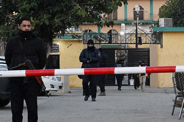 Police stand guard at the scene a day after the suicide bombing of a Shiite mosque in Islamabad on February 7, 2026. A worshipper at the Shiite mosque in Islamabad where dozens of people were killed in a suicide blast on February 6 described an "extremely powerful" explosion ripping through the building just after prayers started. (Photo by Aamir QURESHI / AFP)