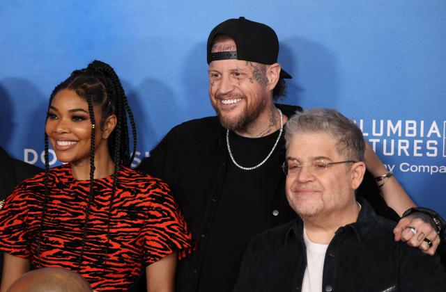 US actress Gabrielle Union (L), US rapper Jelly Roll (C) and US actor comedian Patton Oswalt (R) attend the LA premiere of Columbia Pictures and Sony Pictures Animation's "Goat" at the AMC Century City 15 in Los Angeles on February 6, 2026. (Photo by Michael Tran / AFP)