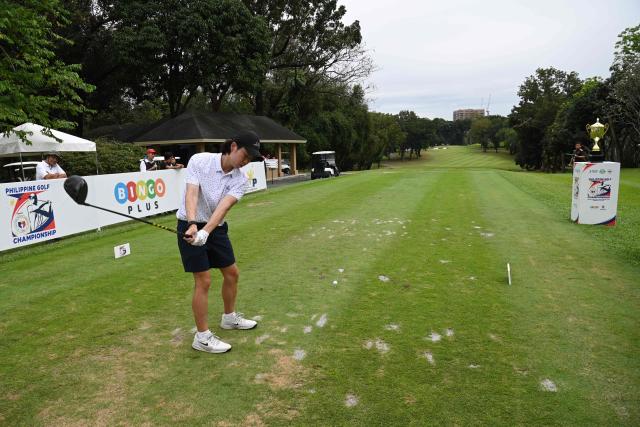 Philippines' Brycen Ko tees off during the third round of the Philippines Golf Championship tournament at the Wack Wack Golf and Country Club in Manila on February 7, 2026. (Photo by Ted ALJIBE / AFP)