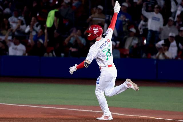 Charros de Jalisco's #79 Connor Hollis celebrates after hitting a home run in the second inning of the Caribbean Series baseball tournament semi-final game between Mexico's Charros de Jalisco and Puerto Rico's Cangrejeros de Santurce at the Panamerican Stadium in Jalisco, Mexico, on February 6, 2026. (Photo by Ulises Ruiz / AFP)