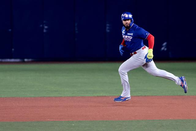 Cangrejeros de Santurce's #1 Gabriel Cancel celebrates runs after hitting a home run in the third inning of the Caribbean Series baseball tournament semi-final game between Mexico's Charros de Jalisco and Puerto Rico's Cangrejeros de Santurce at the Panamerican Stadium in Jalisco, Mexico, on February 6, 2026. (Photo by Ulises Ruiz / AFP)