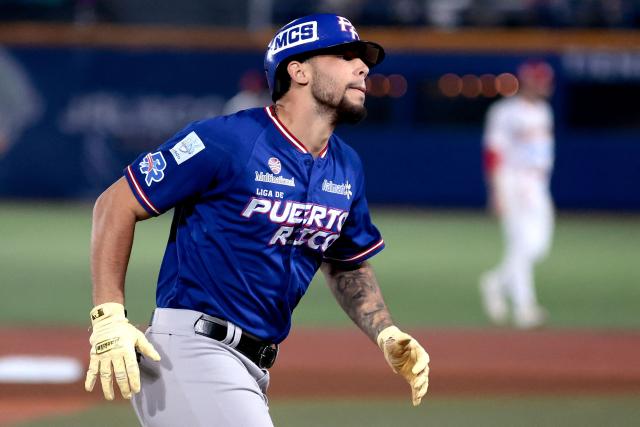 Cangrejeros de Santurce's #18 Yohandy Morales runs to home after hitting a home run in the first inning of the Caribbean Series baseball tournament semi-final game between Mexico's Charros de Jalisco and Puerto Rico's Cangrejeros de Santurce at the Panamerican Stadium in Jalisco, Mexico, on February 6, 2026. (Photo by Ulises Ruiz / AFP)
