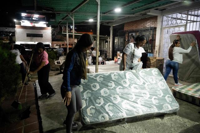 Relatives of political prisoners set up a camp to wait for news of prisoner releases outside El Rodeo I prison in Guatire, Miranda state, some 30 kilometers east of Caracas, on February 6, 2026. Venezuela's parliament chief, a former member of ousted leader Nicolas Maduro's inner circle, on February 6 promised the speedy release of remaining political prisoners during a meeting with their relatives. "By Friday (February 13) at the latest they will all be free," Jorge Rodriguez told prisoners' families outside the notorious Zona 7 detention center in Caracas. (Photo by Maryorin Mendez / AFP)