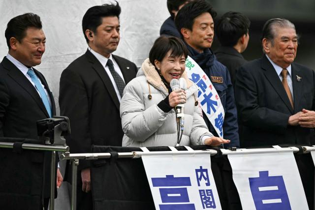Japan's Prime Minister and President of the Liberal Democratic Party (LDP) Sanae Takaichi (C) delivers a campaign speech ahead of the House of Representatives election, at Rekisen Park in Tokyo on February 7, 2026. (Photo by Philip FONG / AFP)