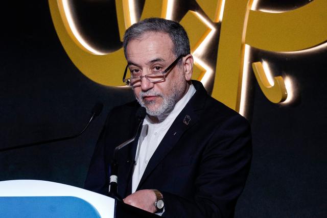 Iran’s Foreign Minister Abbas Araghchi looks on as he speaks during the 17th edition of the Al-Jazeera Forum in Doha on February 7, 2026. (Photo by Karim JAAFAR / AFP)