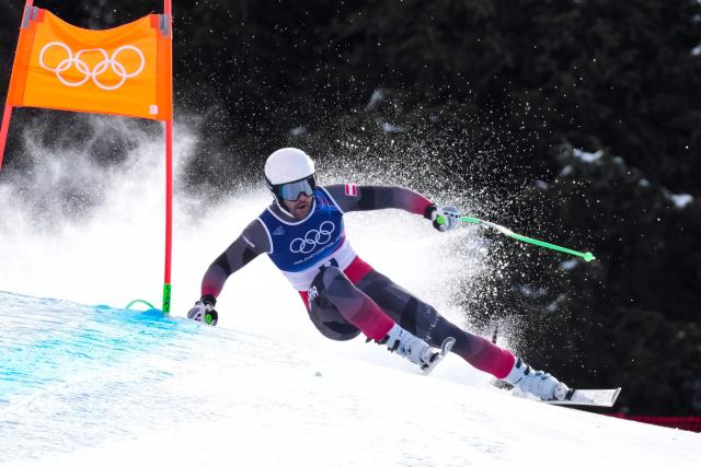 Austria's Vincent Kriechmayr competes in the men's downhill alpine skiing event during the Milano Cortina 2026 Winter Olympic Games at the Stelvio Ski Centre in Bormio (Valtellina) on February 7, 2026. (Photo by Dimitar DILKOFF / AFP)