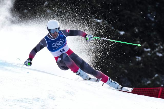 Austria's Vincent Kriechmayr competes in the men's downhill alpine skiing event during the Milano Cortina 2026 Winter Olympic Games at the Stelvio Ski Centre in Bormio (Valtellina) on February 7, 2026. (Photo by Dimitar DILKOFF / AFP)