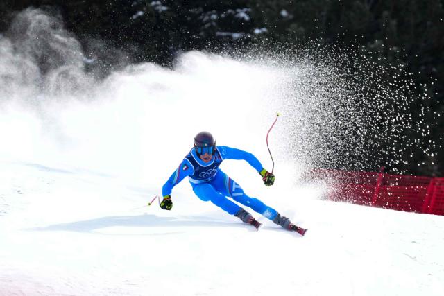 Italy's Giovanni Franzoni competes in the men's downhill alpine skiing event during the Milano Cortina 2026 Winter Olympic Games at the Stelvio Ski Centre in Bormio (Valtellina) on February 7, 2026. (Photo by Dimitar DILKOFF / AFP)