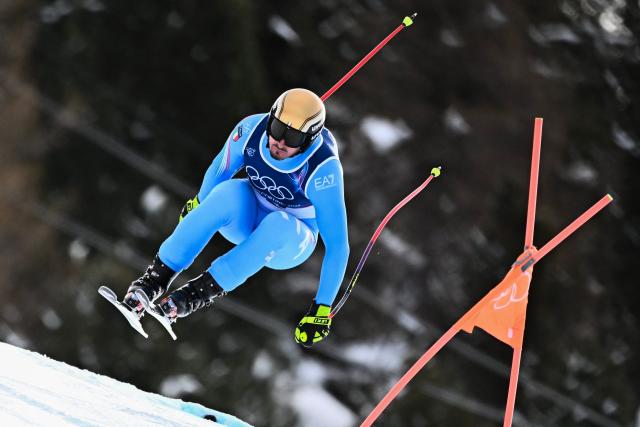 Italy's Dominik Paris competes in the men's downhill alpine skiing event during the Milano Cortina 2026 Winter Olympic Games at the Stelvio Ski Centre in Bormio (Valtellina) on February 7, 2026. (Photo by Fabrice COFFRINI / AFP)
