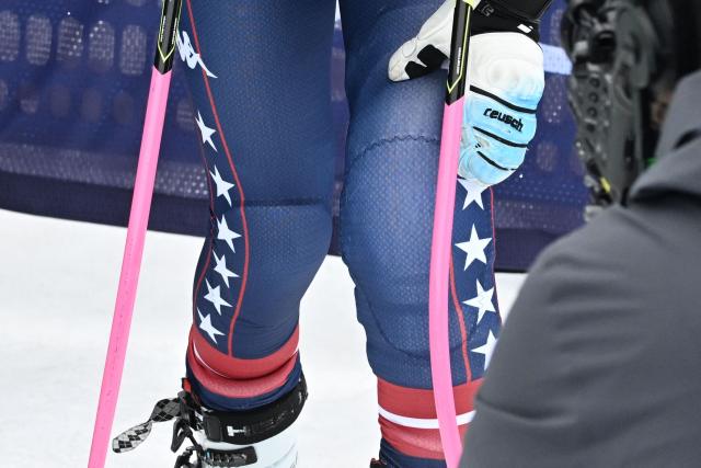 US' Lindsey Vonn touches her knee during an official training for the women's downhill event during the Milano Cortina 2026 Winter Olympic Games at the Tofane Alpine Skiing Centre in Cortina d’Ampezzo on February 7, 2026. (Photo by Tiziana FABI / AFP)