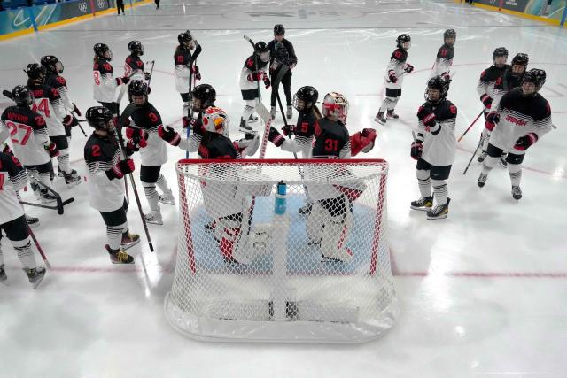 Japan's players prepare for their women's preliminary round Group B Ice Hockey match against Germany at the Milano Rho Ice Hockey Arena at the Milano Cortina 2026 Winter Olympic Games in Milan, on February 7, 2026. (Photo by Darko Bandic / POOL / AFP)