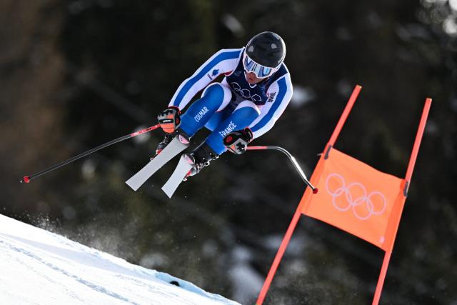 France's Alban Elezi Cannaferina competes in the men's downhill alpine skiing event during the Milano Cortina 2026 Winter Olympic Games at the Stelvio Ski Centre in Bormio (Valtellina) on February 7, 2026. (Photo by Fabrice COFFRINI / AFP)