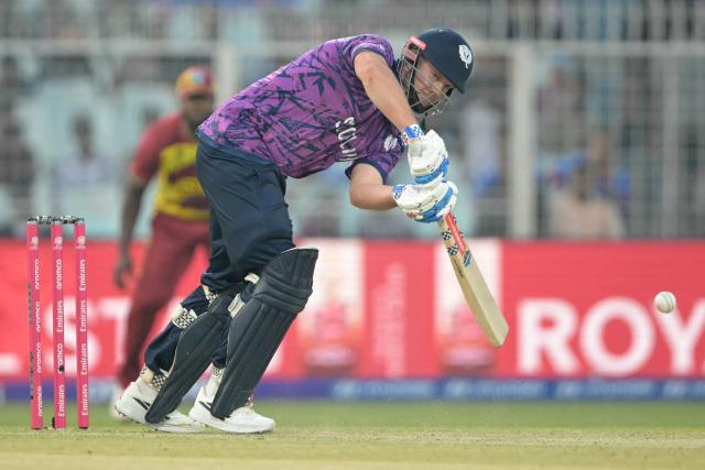 Scotland's George Munsey plays a shot during the 2026 ICC Men's T20 Cricket World Cup group stage match between Scotland and West Indies at the Eden Gardens in Kolkata on February 7, 2026. (Photo by Dibyangshu SARKAR / AFP)