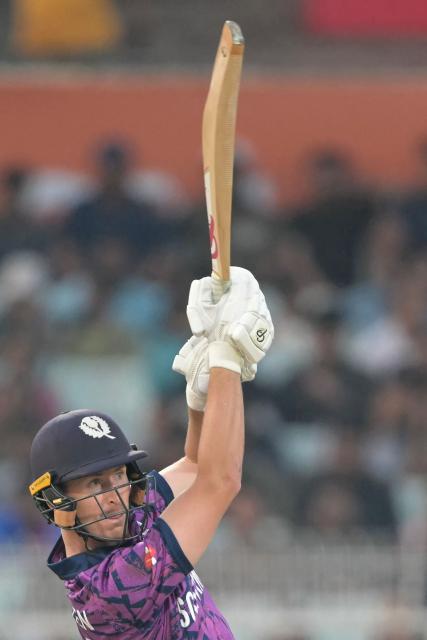 Scotland's Brandon McMullen plays a shot during the 2026 ICC Men's T20 Cricket World Cup group stage match between Scotland and West Indies at the Eden Gardens in Kolkata on February 7, 2026. (Photo by Dibyangshu SARKAR / AFP)
