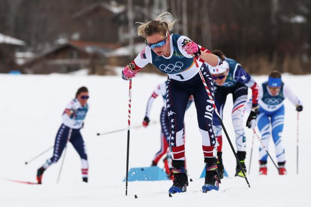USA's Jessie Diggins competes during the women's cross country 10km + 10km skiathlon event of the Milano Cortina 2026 Winter Olympic Games at Tesero Cross-Country Skiing Stadium in Lago di Tesero (Val di Fiemme) on February 7, 2026. (Photo by Anne-Christine POUJOULAT / AFP)