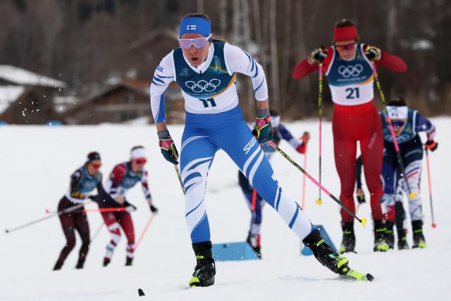 Finland's Kerttu Niskanen competes during the women's cross country 10km + 10km skiathlon event of the Milano Cortina 2026 Winter Olympic Games at Tesero Cross-Country Skiing Stadium in Lago di Tesero (Val di Fiemme) on February 7, 2026. (Photo by Anne-Christine POUJOULAT / AFP)