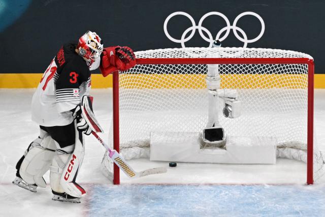 Japan's goalkeeper #31 Riko Kawaguchi reacts after Germany scored their fifth goal during the women's preliminary round Group B Ice Hockey match between Germany and Japan at the Milano Rho Ice Hockey Arena at the Milano Cortina 2026 Winter Olympic Games in Milan, on February 7, 2026. (Photo by Alexander NEMENOV / AFP)
