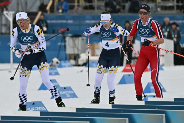 (From L) Sweden's Frida Karlsson, Sweden's Ebba Andersson and Norway's Astrid Oeyre Slind compete during the women's cross country 10km + 10km skiathlon event of the Milano Cortina 2026 Winter Olympic Games at Tesero Cross-Country Skiing Stadium in Lago di Tesero (Val di Fiemme) on February 7, 2026. (Photo by Javier SORIANO / AFP)