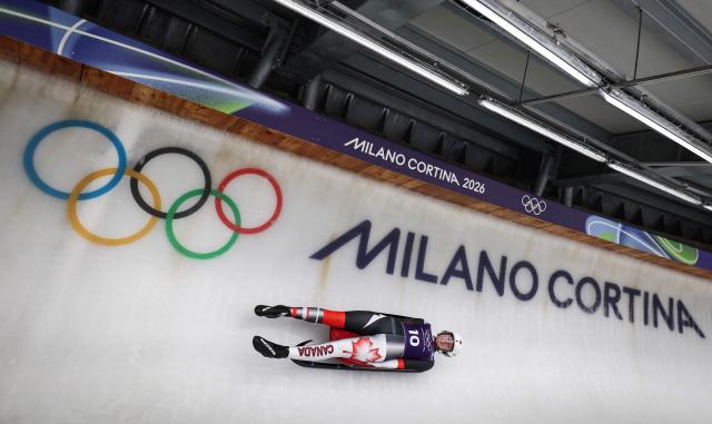 Canada's Trinity Ellis takes part in the luge women's singles training session at Cortina Sliding Centre during the Milano Cortina 2026 Winter Olympic Games in Cortina d'Ampezzo on February 7, 2026. (Photo by FRANCK FIFE / AFP)