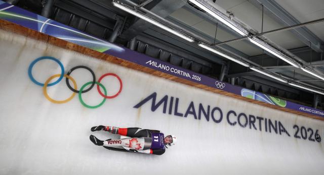 Canada's Embyr-Lee Susko takes part in the luge women's singles training session at Cortina Sliding Centre during the Milano Cortina 2026 Winter Olympic Games in Cortina d'Ampezzo on February 7, 2026. (Photo by FRANCK FIFE / AFP)