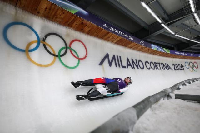 South Korea's Jung Hyesun takes part in the luge women's singles training session at Cortina Sliding Centre during the Milano Cortina 2026 Winter Olympic Games in Cortina d'Ampezzo on February 7, 2026. (Photo by FRANCK FIFE / AFP)