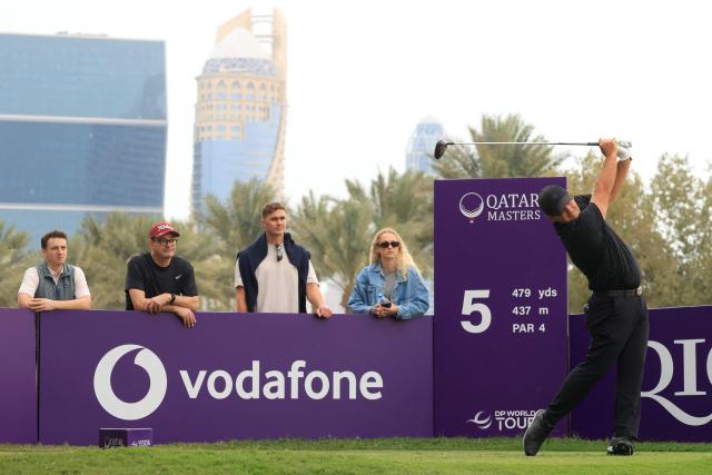 US golfer Patrick Reed plays his tee shot on the 5th hole during the third day of the Qatar Masters 2026 golf tournament at Doha Golf Club in Doha on February 7, 2026. (Photo by Karim JAAFAR / AFP)