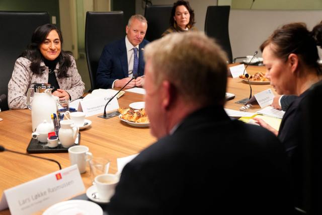 Danish Foreign Minister Lars Loekke Rasmussen (Bottom L), Canada's Foreign Minister Anita Anand (Top L) and Greenland's Minister for Foreign Affairs Vivian Motzfeldt (R) meet in Nuuk, Greenland on February 7, 2026. (Photo by Ida Marie Odgaard / Ritzau Scanpix / AFP) / Denmark OUT