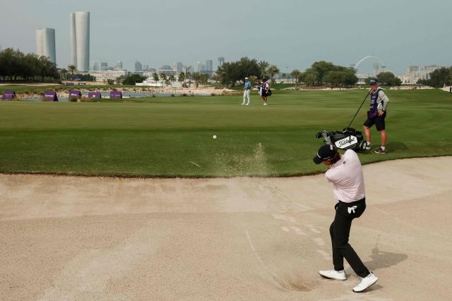 Denmark's Jacob Skov Olesen plays a shot on the 9th hole during the third day of the Qatar Masters 2026 golf tournament at Doha Golf Club in Doha on February 7, 2026. (Photo by Karim JAAFAR / AFP)