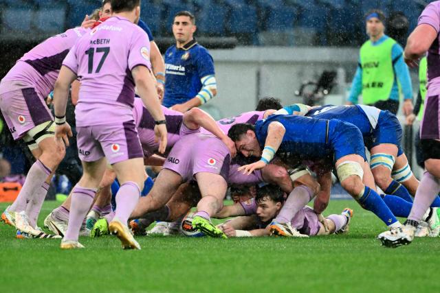 Players fight in a scrum during the Six Nations international rugby union match between Italy and Scotland at the Stadio Olimpico, in Rome, on February 7, 2026. (Photo by Alberto PIZZOLI / AFP)