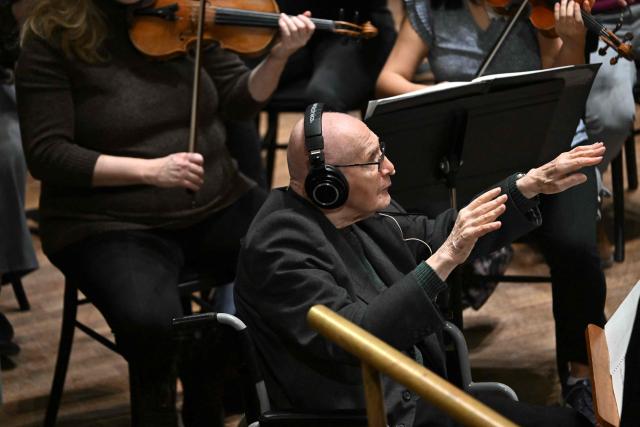 Hungarian composer Gyorgy Kurtag is seen on the stage of the Liszt Ferenc Academy of Music in Budapest on February 7, 2026 during his workshop with Hungarian symphony orchestra. The management of the Academy of Music paid tribute to the living legend of contemporary music who will celebrate his 100th birthday on February 19, 2026. (Photo by Attila KISBENEDEK / AFP)