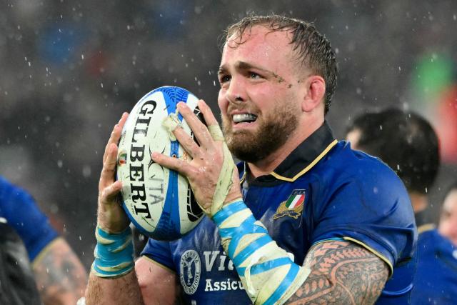 Italy's second row #04 Niccolo Cannone celebrates after winning the Six Nations international rugby union match between Italy and Scotland at the Stadio Olimpico, in Rome, on February 7, 2026. (Photo by Alberto PIZZOLI / AFP)