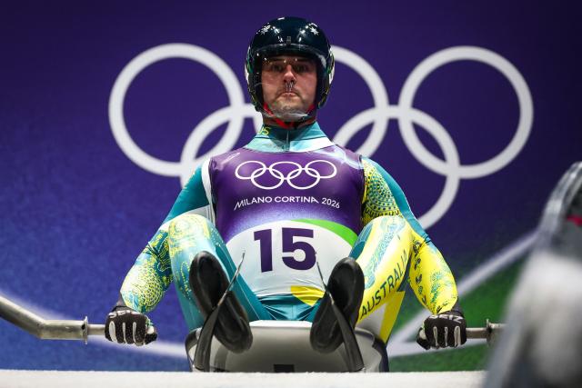 Australia's Alexander Ferlazzo takes the start to compete in the luge men's singles run 1 at Cortina Sliding Centre during the Milano Cortina 2026 Winter Olympic Games in Cortina d'Ampezzo on February 7, 2026. (Photo by FRANCK FIFE / AFP)
